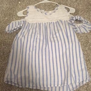 A shoulder less striped shirt